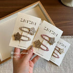 Barrettes Etoile Pailletées